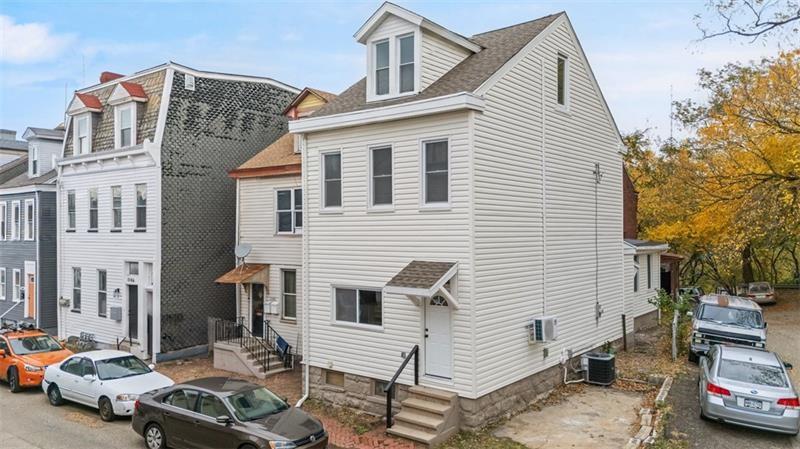 1150 Goettmann Street Pittsburgh, PA 15212 - Photo 32 of 36 a view of a street with cars