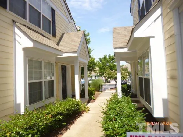 a front view of a house with a porch