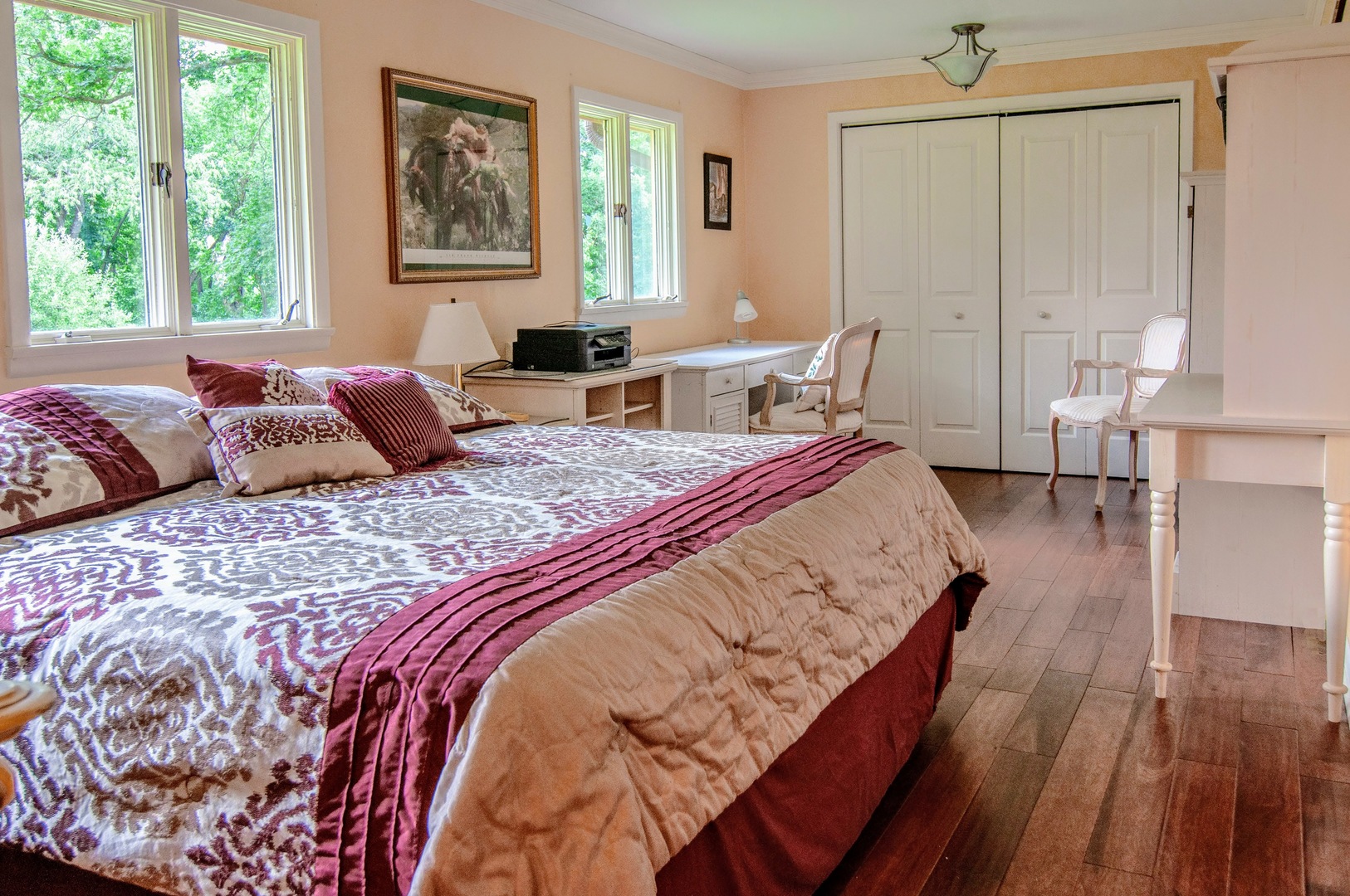 20798 White Oaks Road Morrison, IL 61270 - Photo 18 of 48 a large bedroom with a bed a table and chair