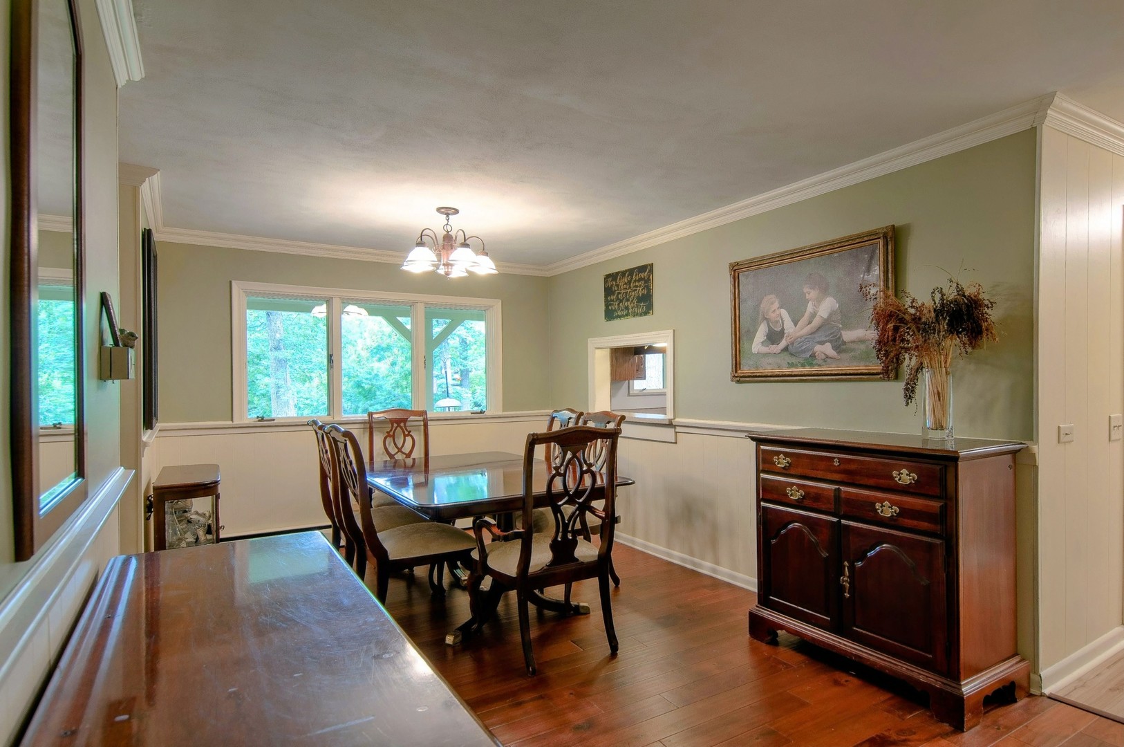 20798 White Oaks Road Morrison, IL 61270 - Photo 25 of 48 a view of a dining room with furniture window and wooden floor