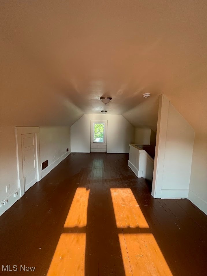 950 Avon Street Akron, OH 44310 - Photo 14 of 15 Bonus room with vaulted ceiling and wood finished floors