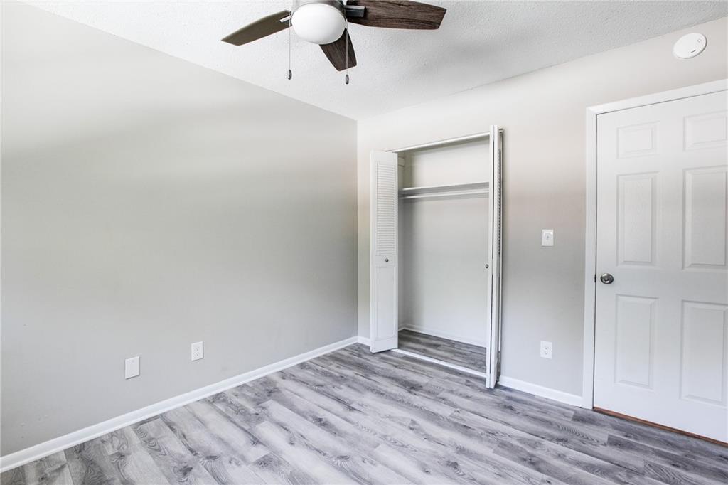 7325 Cardigan Circle Atlanta, GA 30328 - Photo 22 of 25 wooden floor in an empty room