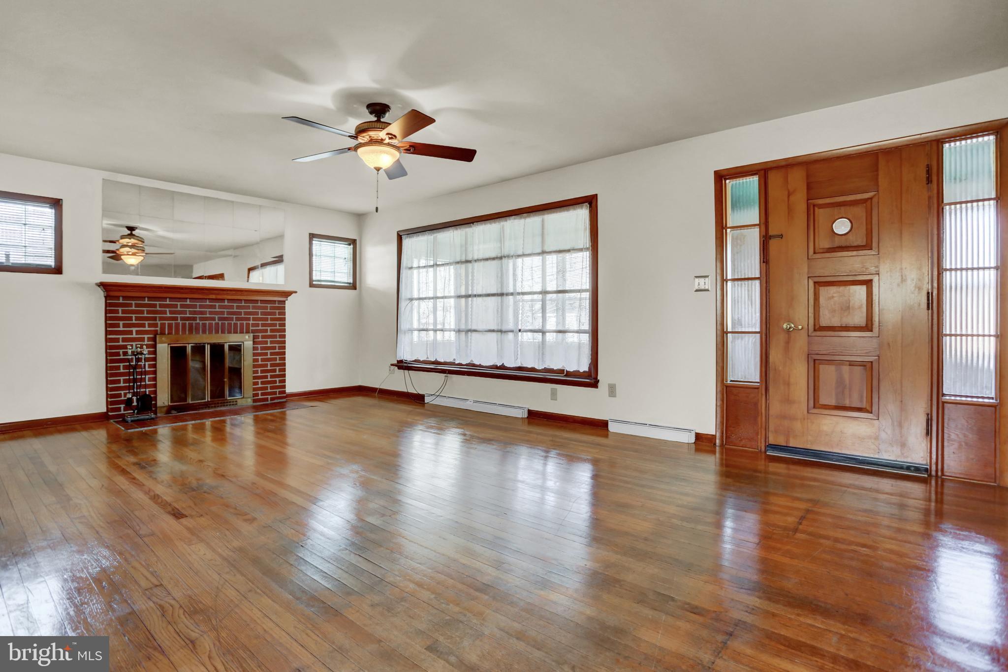 252 Silver Spring Road Mechanicsburg, PA 17050 - Photo 8 of 35 Living room with hardwood floors