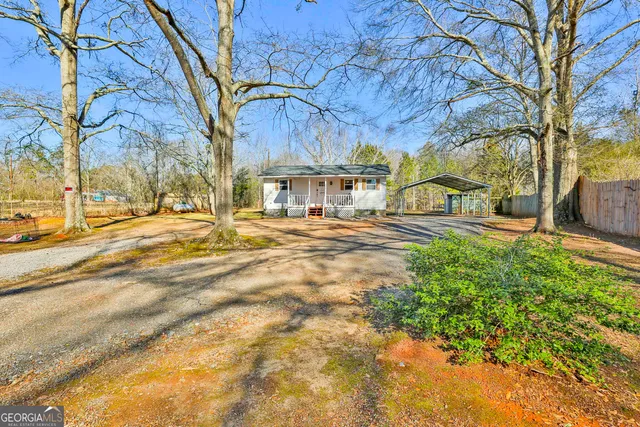 a building view with large trees