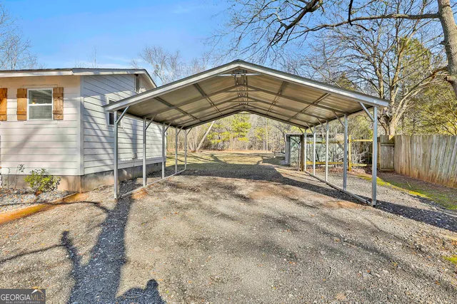 a view of a backyard of the house