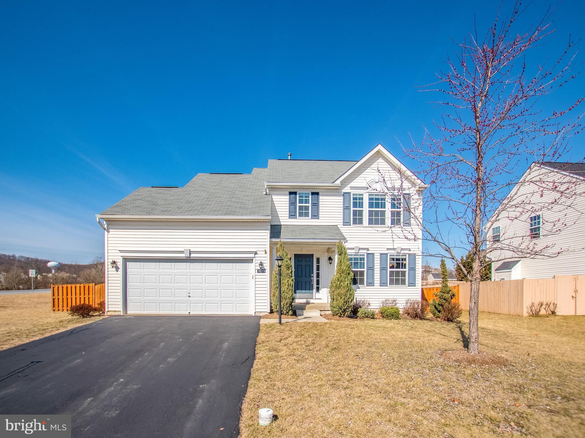 1699 Conrads Ferry Drive Point of Rocks, MD 21777 - Photo 1 of 30 a front view of a house with a yard