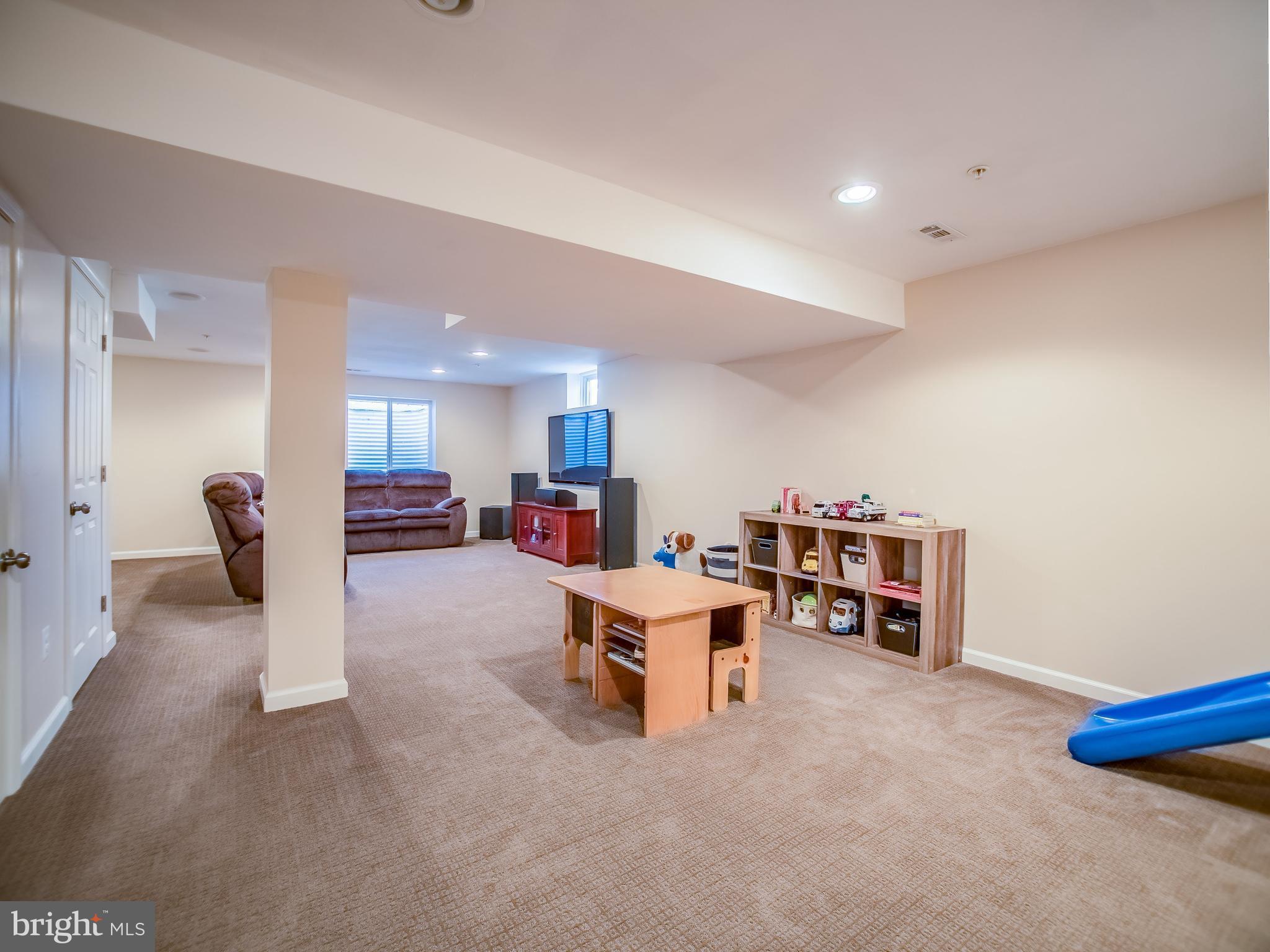 1699 Conrads Ferry Drive Point of Rocks, MD 21777 - Photo 22 of 30 a living room with furniture and a table