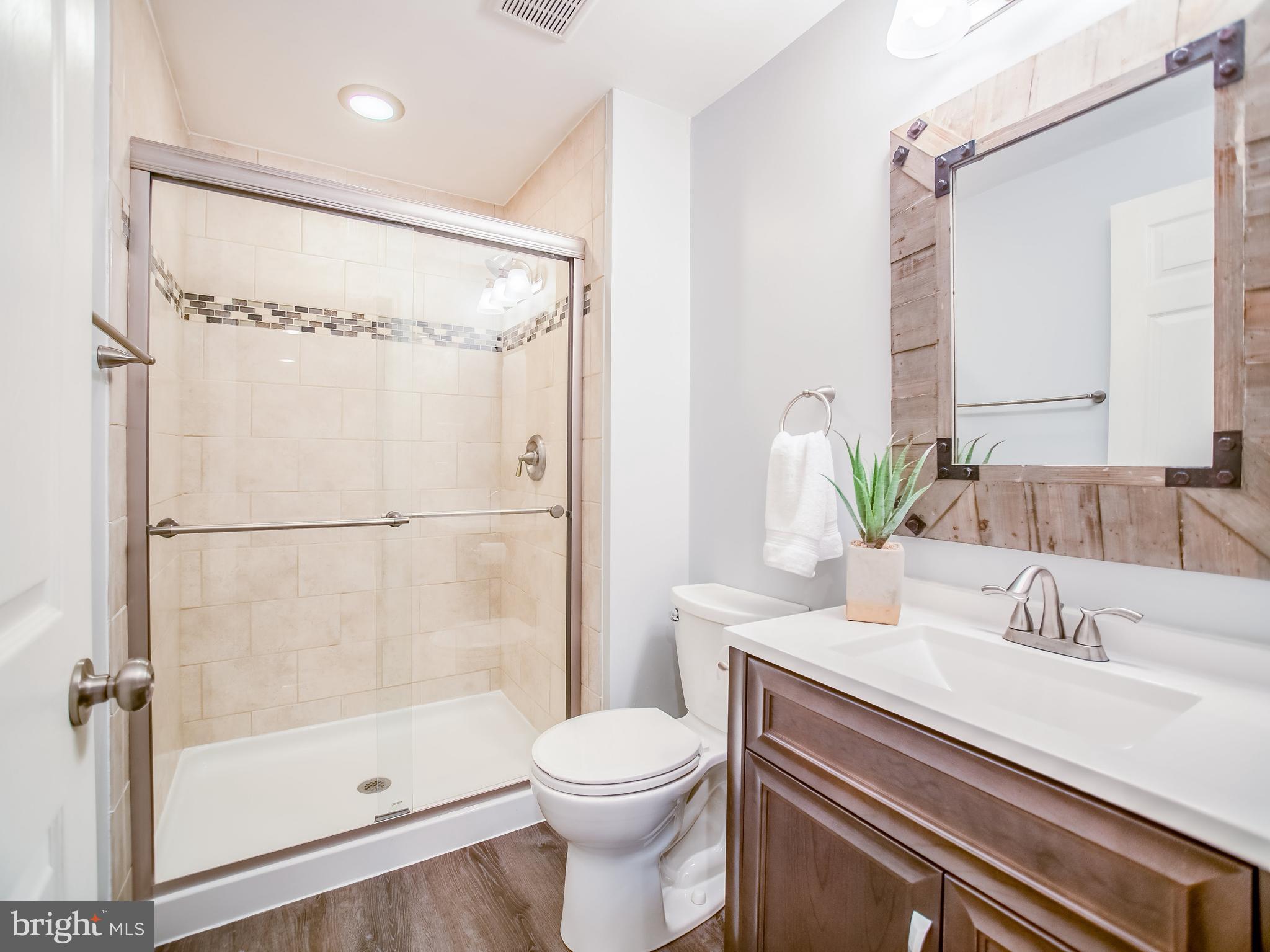 1699 Conrads Ferry Drive Point of Rocks, MD 21777 - Photo 23 of 30 a bathroom with a sink toilet and shower