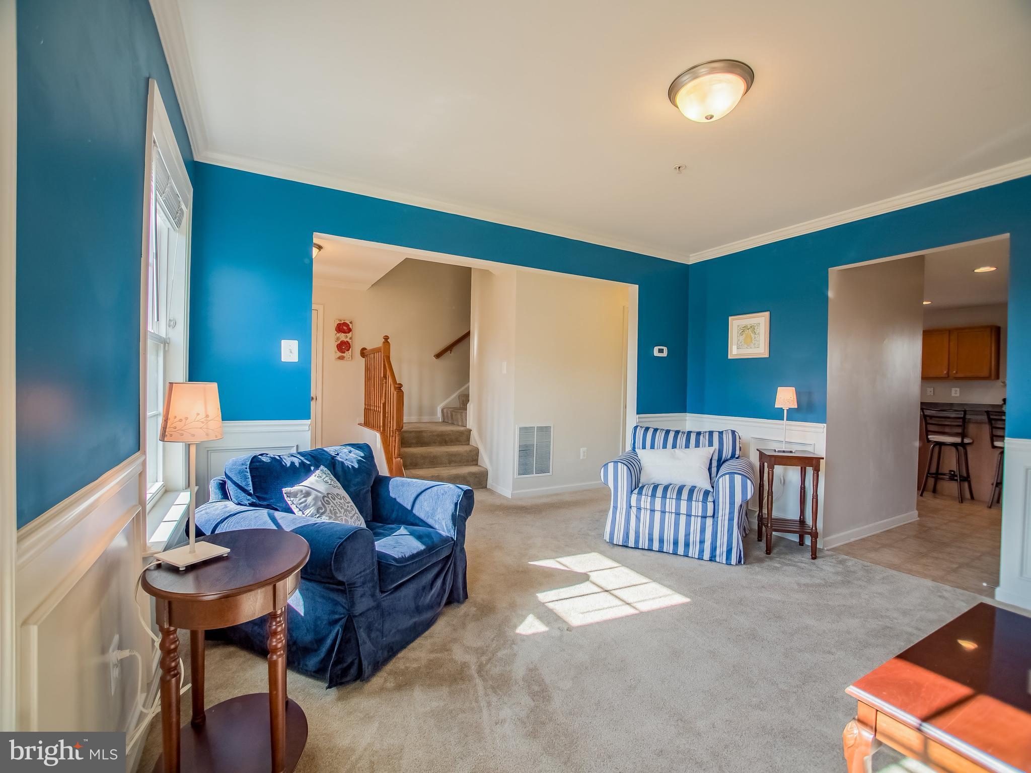 1699 Conrads Ferry Drive Point of Rocks, MD 21777 - Photo 5 of 30 a living room with furniture and a baby crib