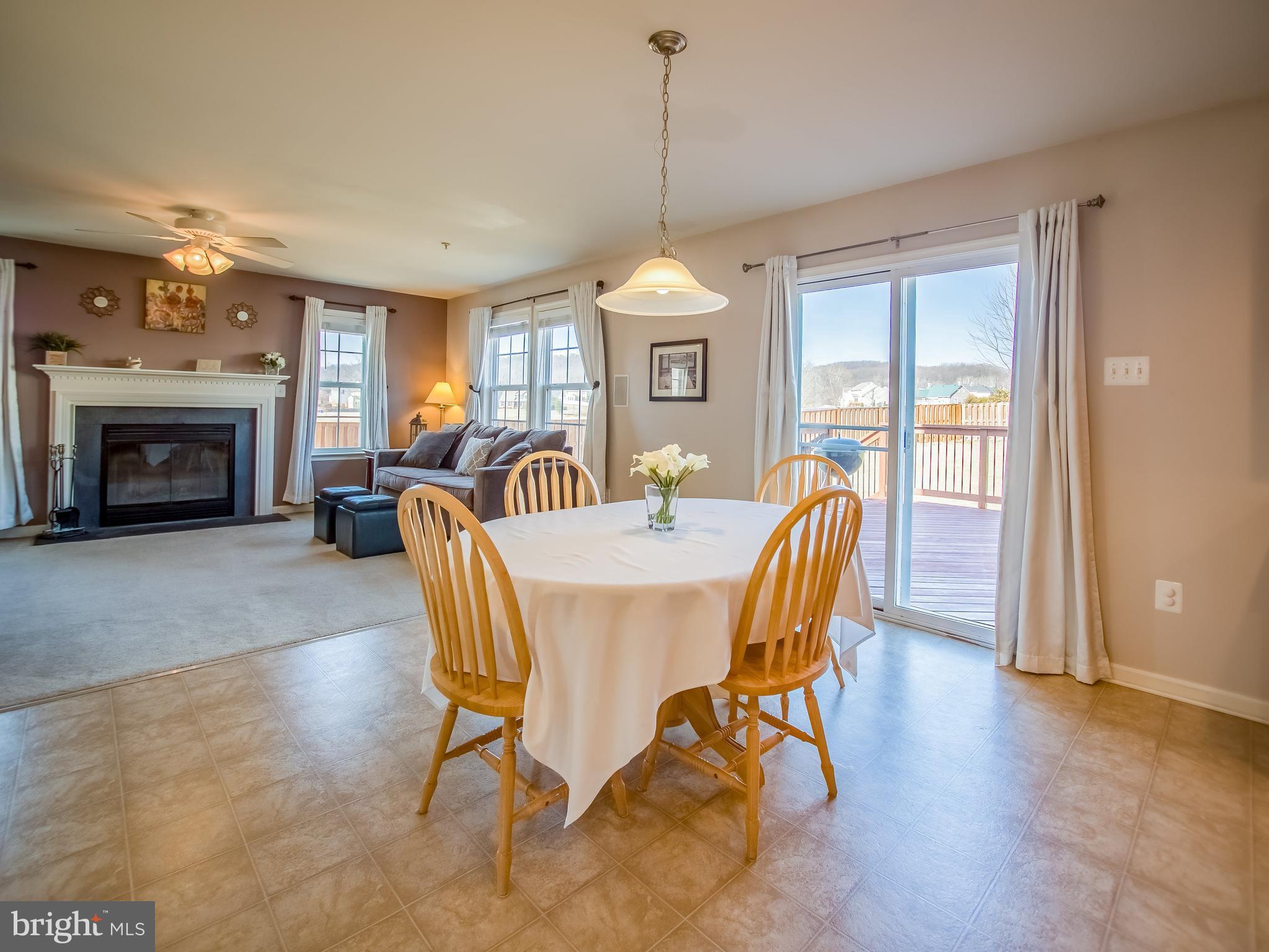 1699 Conrads Ferry Drive Point of Rocks, MD 21777 - Photo 10 of 30 a dining room with furniture window and wooden floor