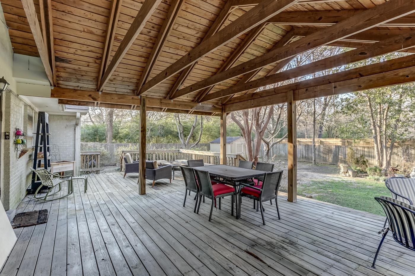 5126 Walnut Grove Road Memphis, TN 38117 - Photo 18 of 23 a view of a patio with table and chairs and wooden floor