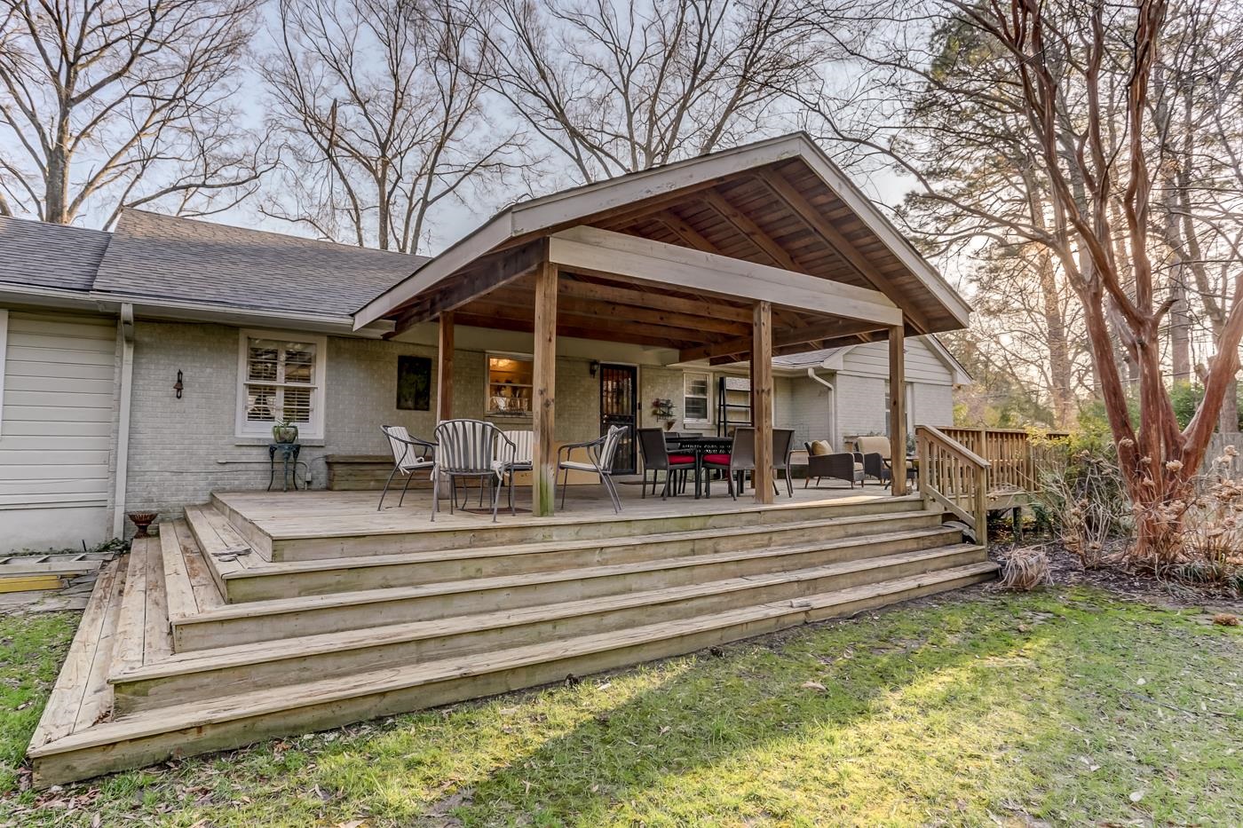 5126 Walnut Grove Road Memphis, TN 38117 - Photo 21 of 23 a view of a house with a patio
