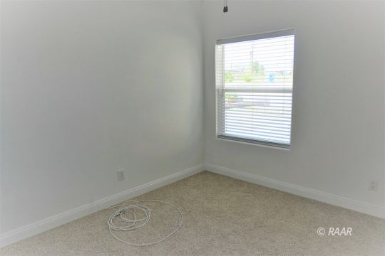 1516 Mayo Street Ridgecrest, CA 93555 - Photo 26 of 33 a view of an empty room with a window