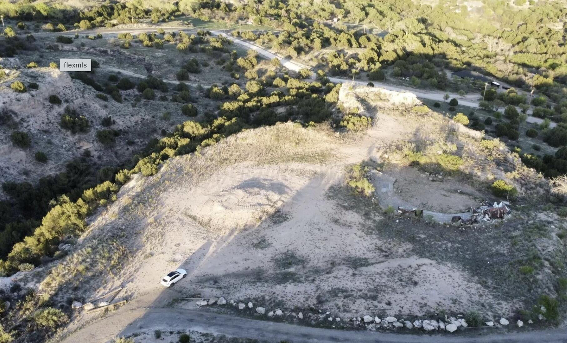 820 Craft Center Road Amarillo, TX 79118 - Photo 4 of 5 a view of a yard with a tree