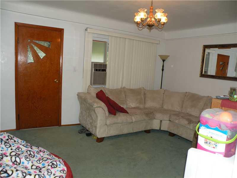 954 Armbrust Hecla Road Mount Pleasant, PA 15685 - Photo 16 of 25 Living Room. Side 2 living room hardwood floors under carpet