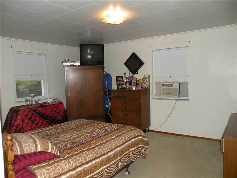 954 Armbrust Hecla Road Mount Pleasant, PA 15685 - Photo 17 of 25 Master Bedroom. Master bedroom side 2 large size room with newer carpet hardwood floors under carpet