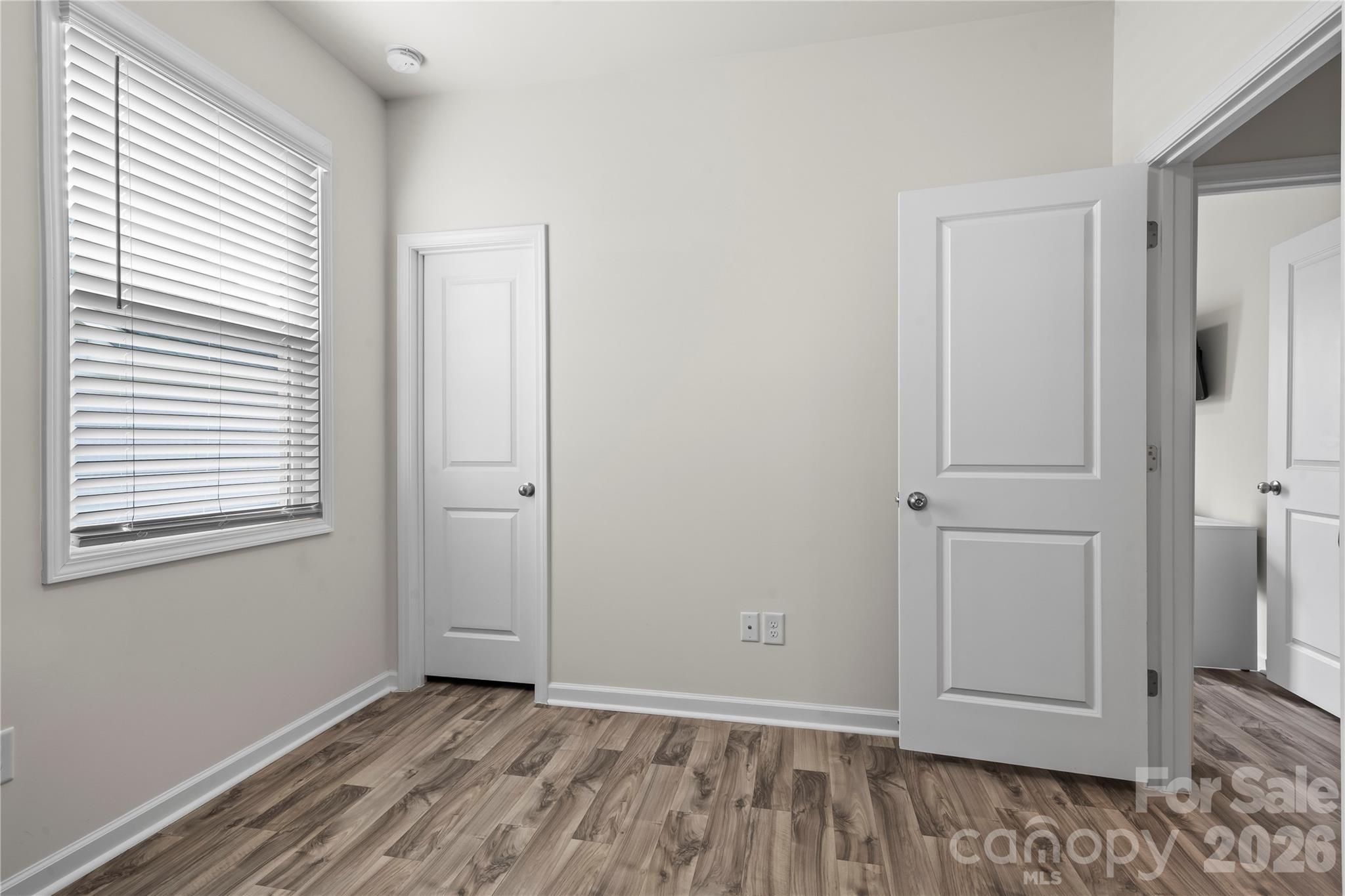 7380 Latham Way Denver, NC 28037 - Photo 18 of 39 an empty room with windows and closet