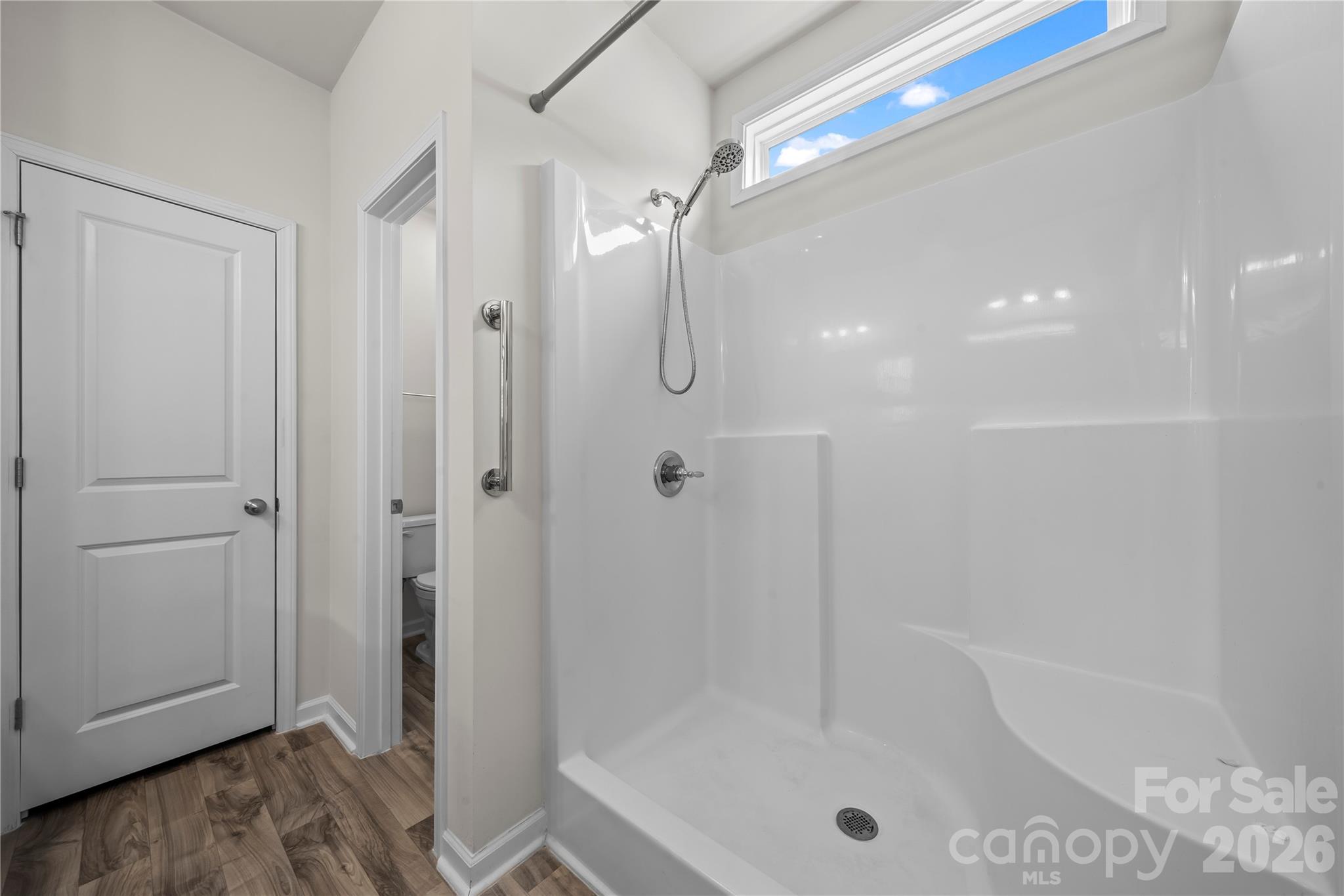 7380 Latham Way Denver, NC 28037 - Photo 21 of 39 a bathroom with a tub shower vanity and a sink