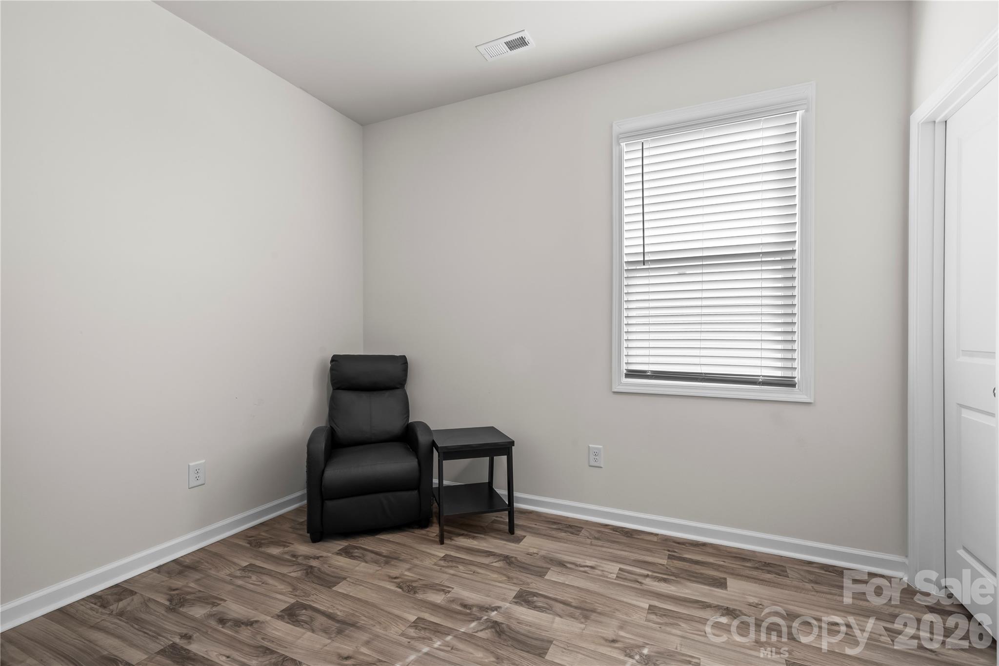 7380 Latham Way Denver, NC 28037 - Photo 22 of 39 a chair and table in a room
