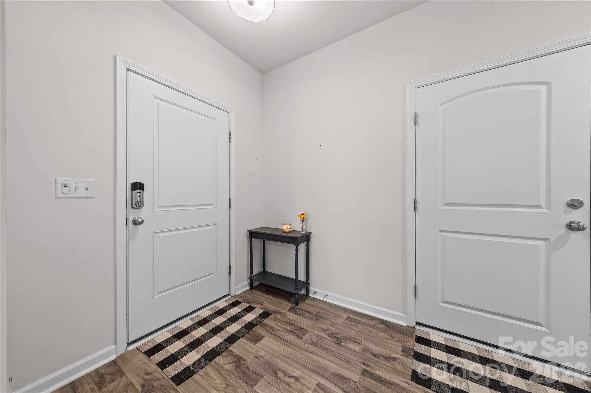 7380 Latham Way Denver, NC 28037 - Photo 27 of 39 a view of a livingroom with wooden floor