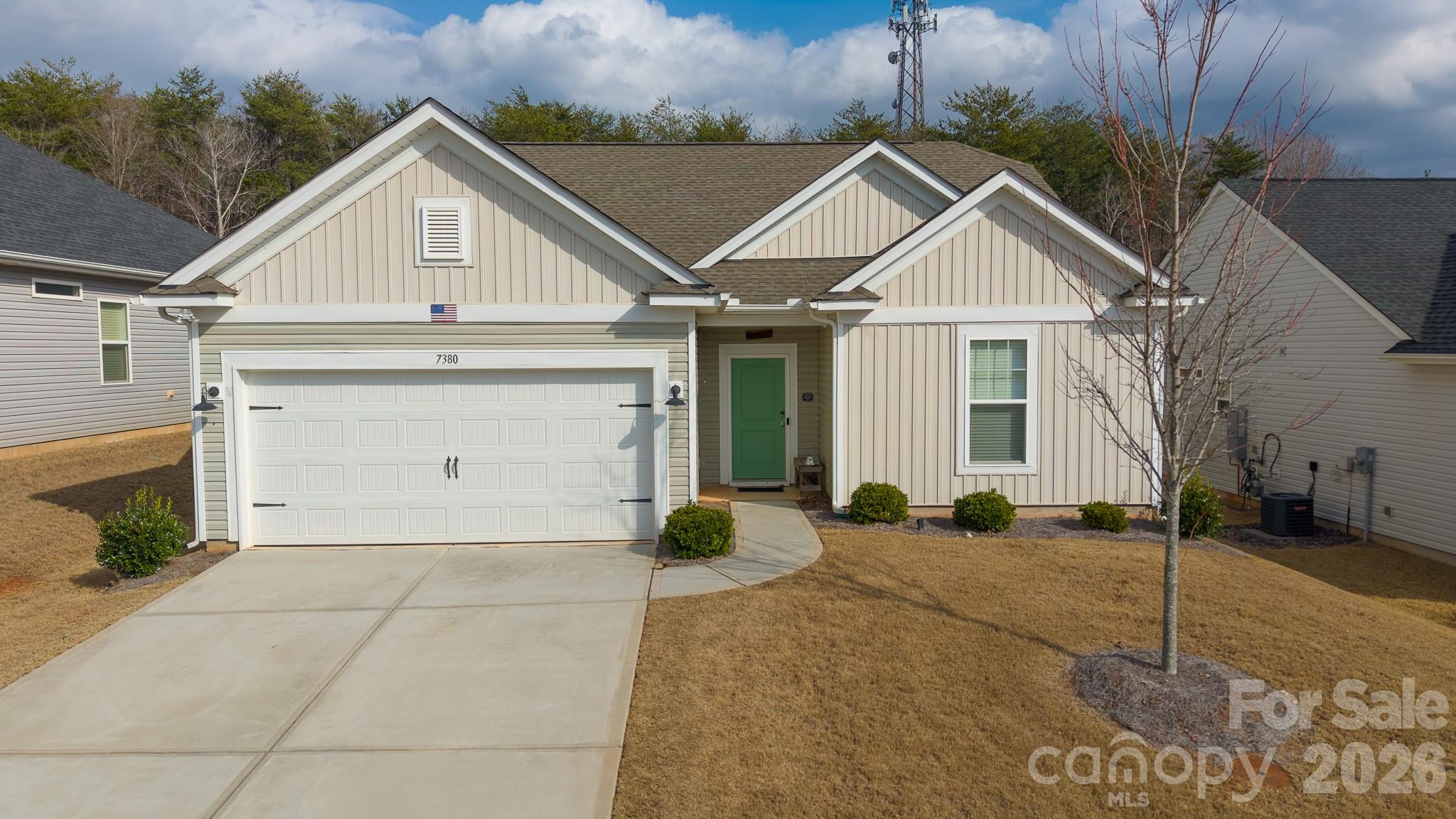 7380 Latham Way Denver, NC 28037 - Photo 39 of 39 a view of a white house with a large space in front of it