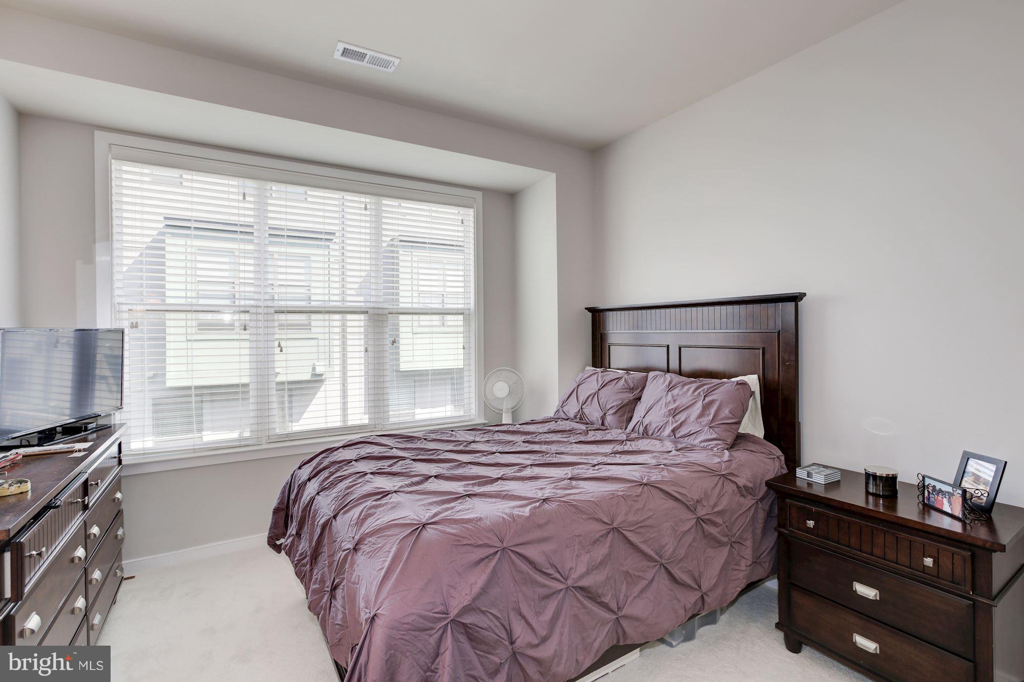 2957 Eskridge Road Fairfax, VA 22031 - Photo 11 of 30 a bedroom with a bed and a window