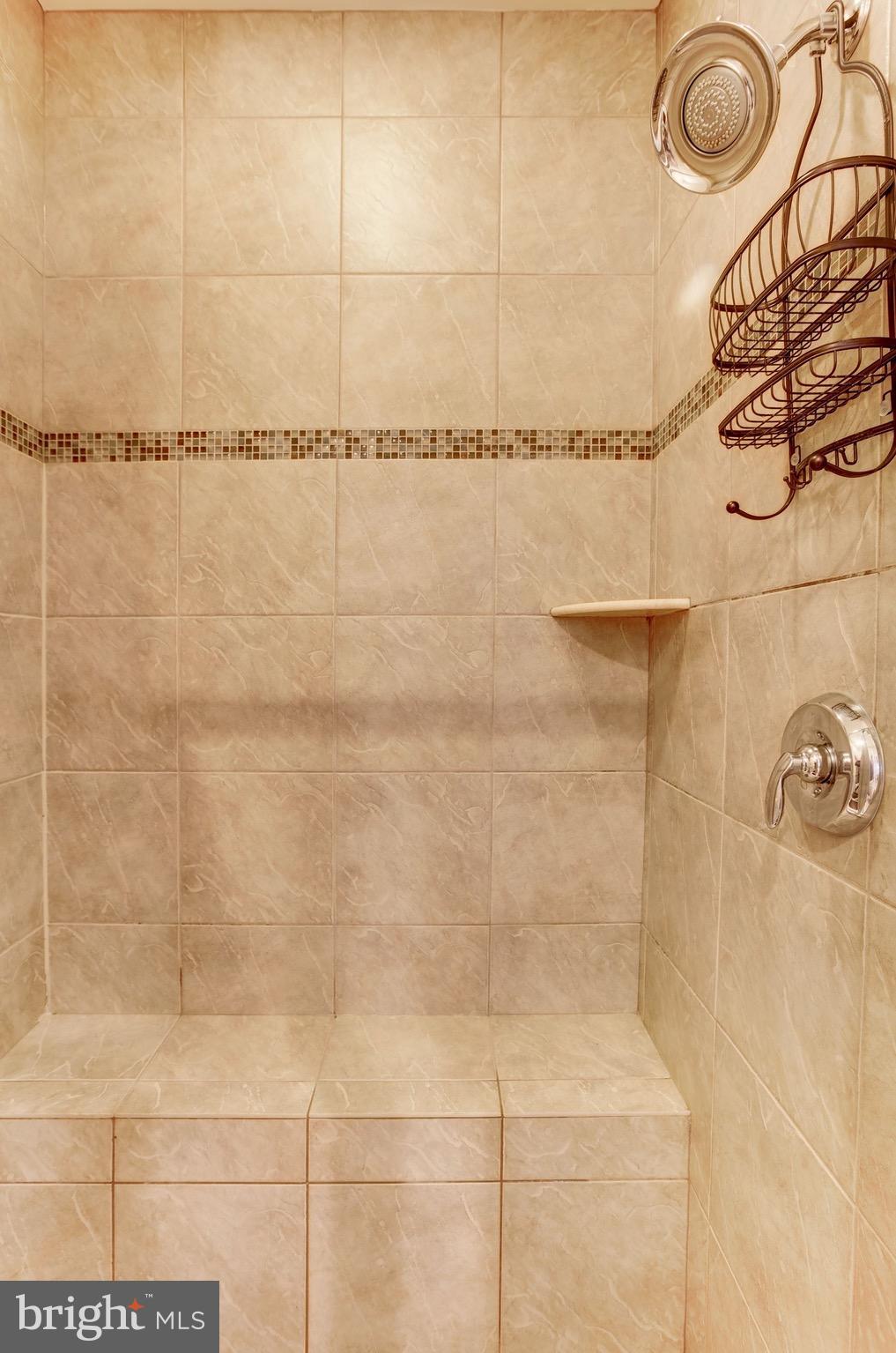 2957 Eskridge Road Fairfax, VA 22031 - Photo 14 of 30 a bathroom with a shower