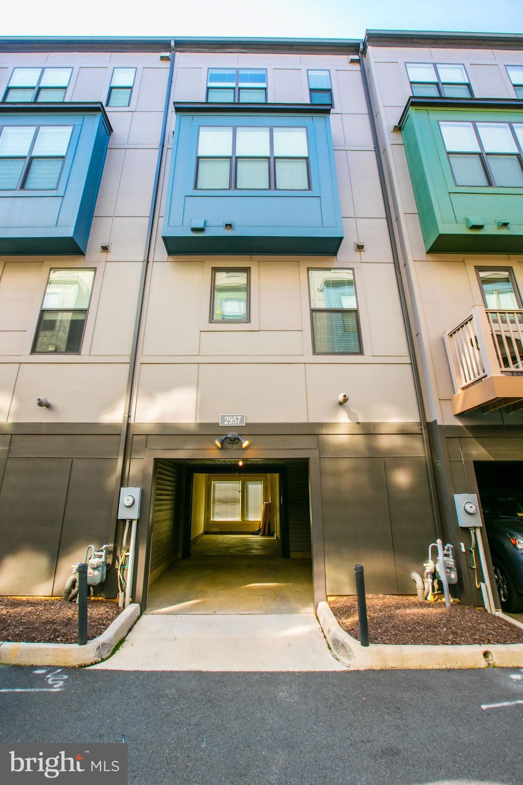 2957 Eskridge Road Fairfax, VA 22031 - Photo 26 of 30 a view of building with car parked