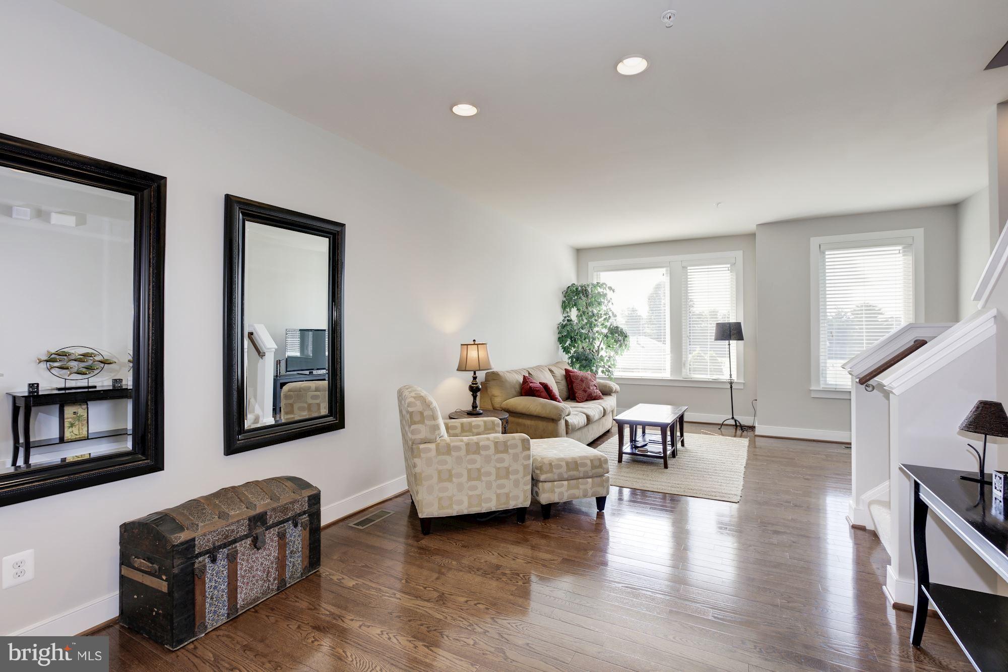 2957 Eskridge Road Fairfax, VA 22031 - Photo 6 of 30 a living room with furniture window and wooden floor