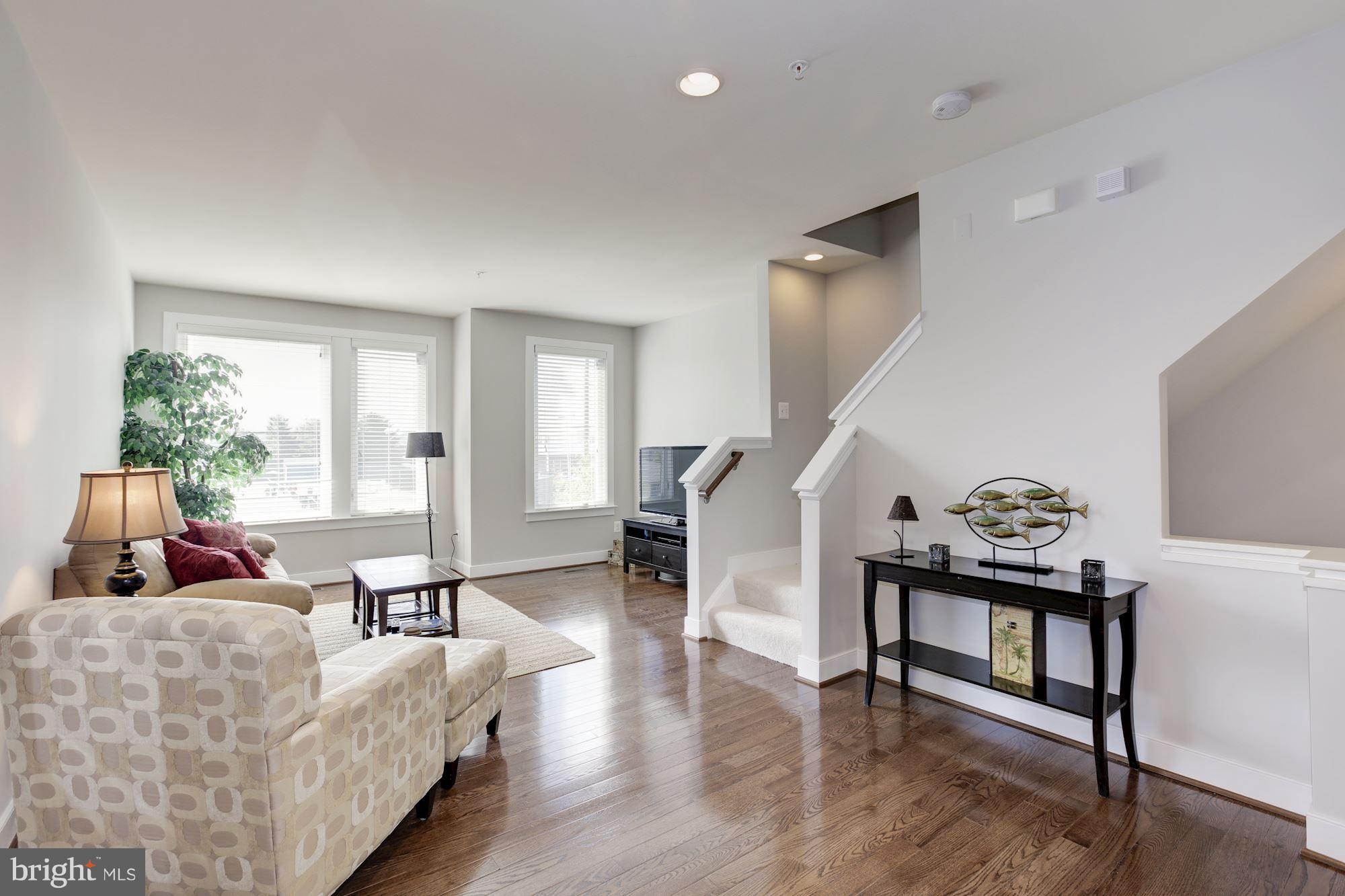 2957 Eskridge Road Fairfax, VA 22031 - Photo 7 of 30 a living room with furniture and a wooden floor