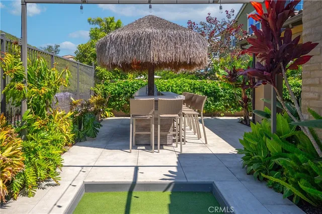 a bedroom with furniture and a chandelier