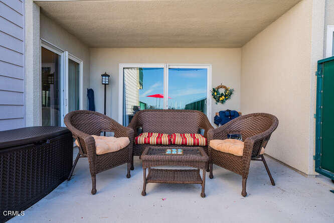 2901 Peninsula Road, Unit 132 Oxnard, CA 93035 - Photo 15 of 38 a living room with furniture and a window