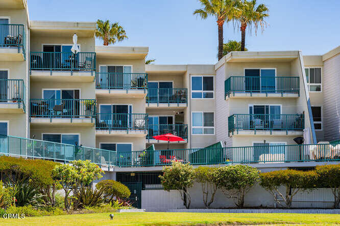 2901 Peninsula Road, Unit 132 Oxnard, CA 93035 - Photo 19 of 38 a front view of a house with swimming pool