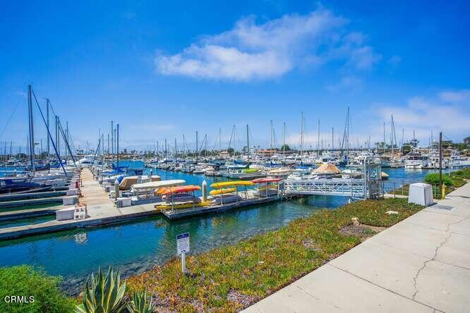 2901 Peninsula Road, Unit 132 Oxnard, CA 93035 - Photo 38 of 38 a view of swimming pool with outdoor seating and yard