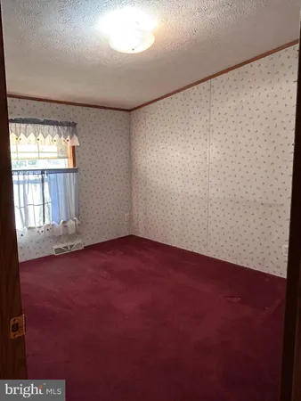 en empty room with windows