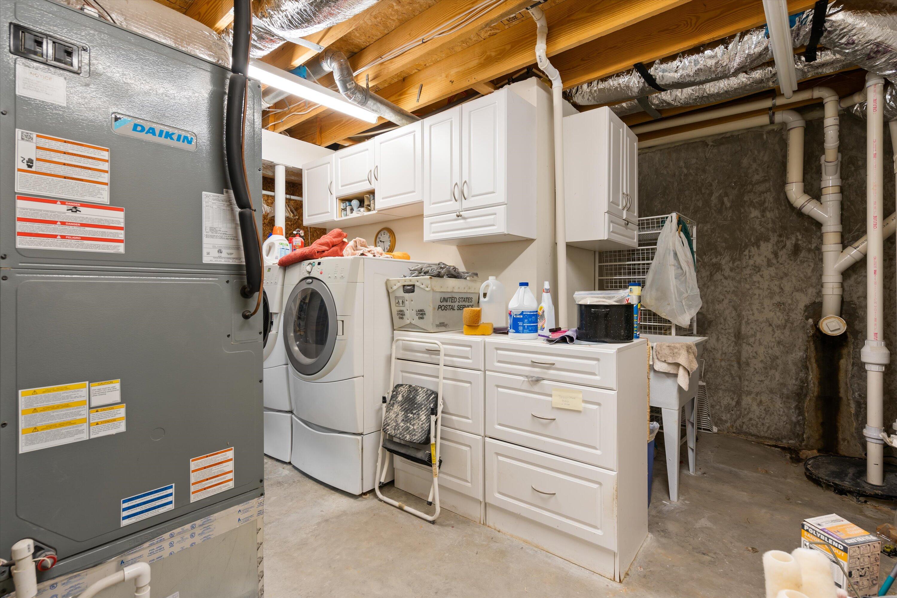 4404 Bethlehem Road Boones Mill, VA 24065 - Photo 25 of 32 a utility room with dryer and washer