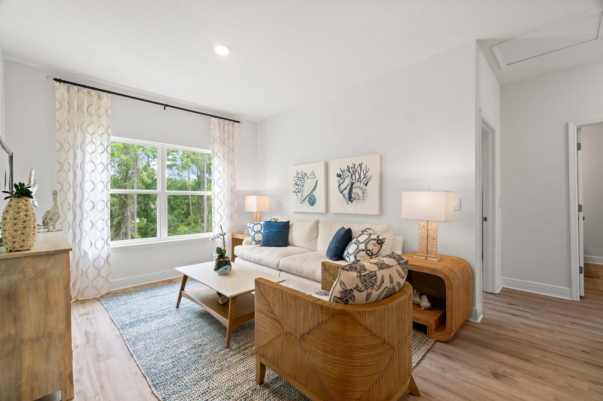 12096 East Harborview Road, Unit LOT 34 Santa Rosa Beach, FL 32459 - Photo 12 of 14 a living room with furniture and a large window