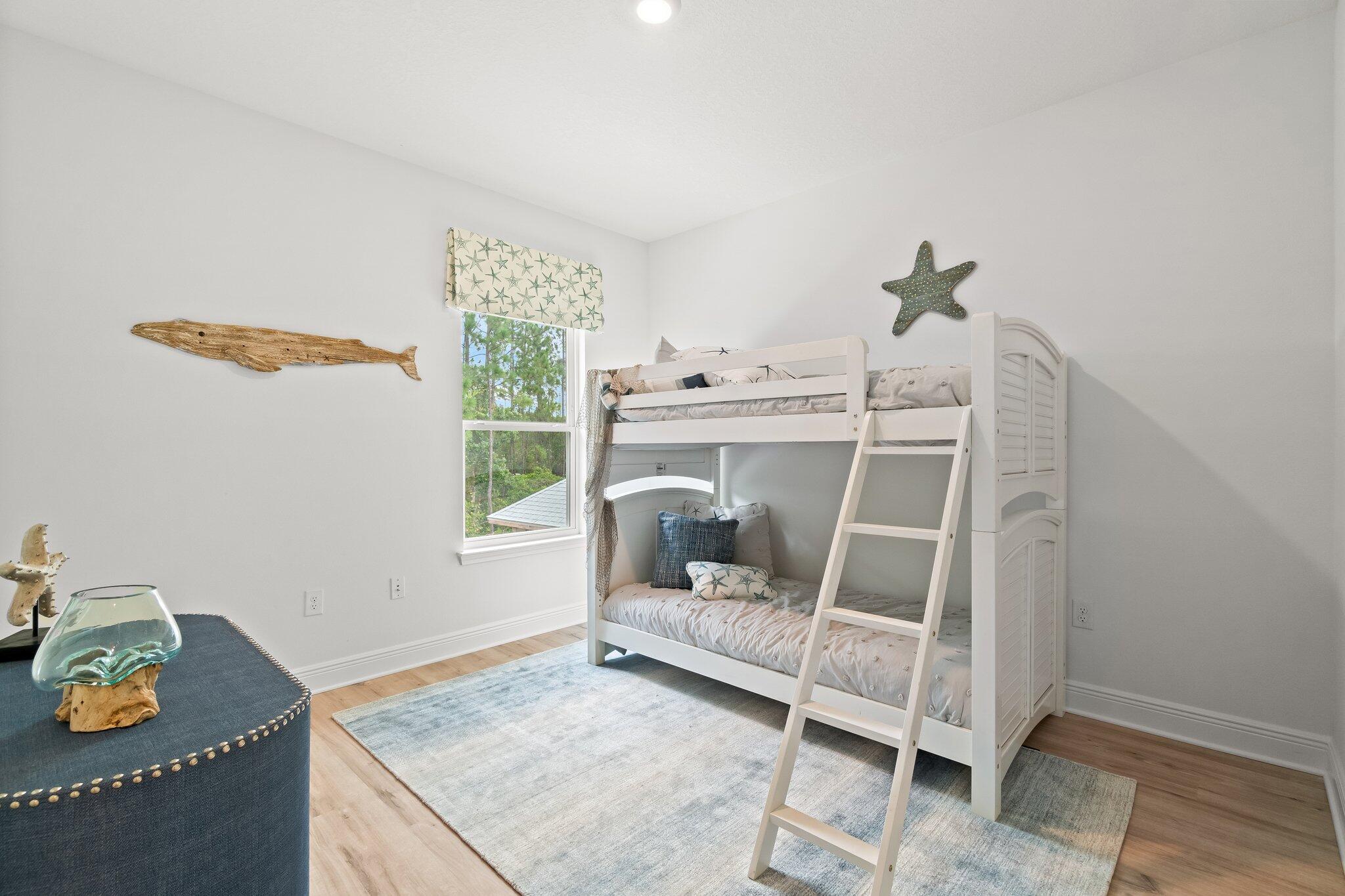 12096 East Harborview Road, Unit LOT 34 Santa Rosa Beach, FL 32459 - Photo 13 of 14 a bedroom with a bed and a window