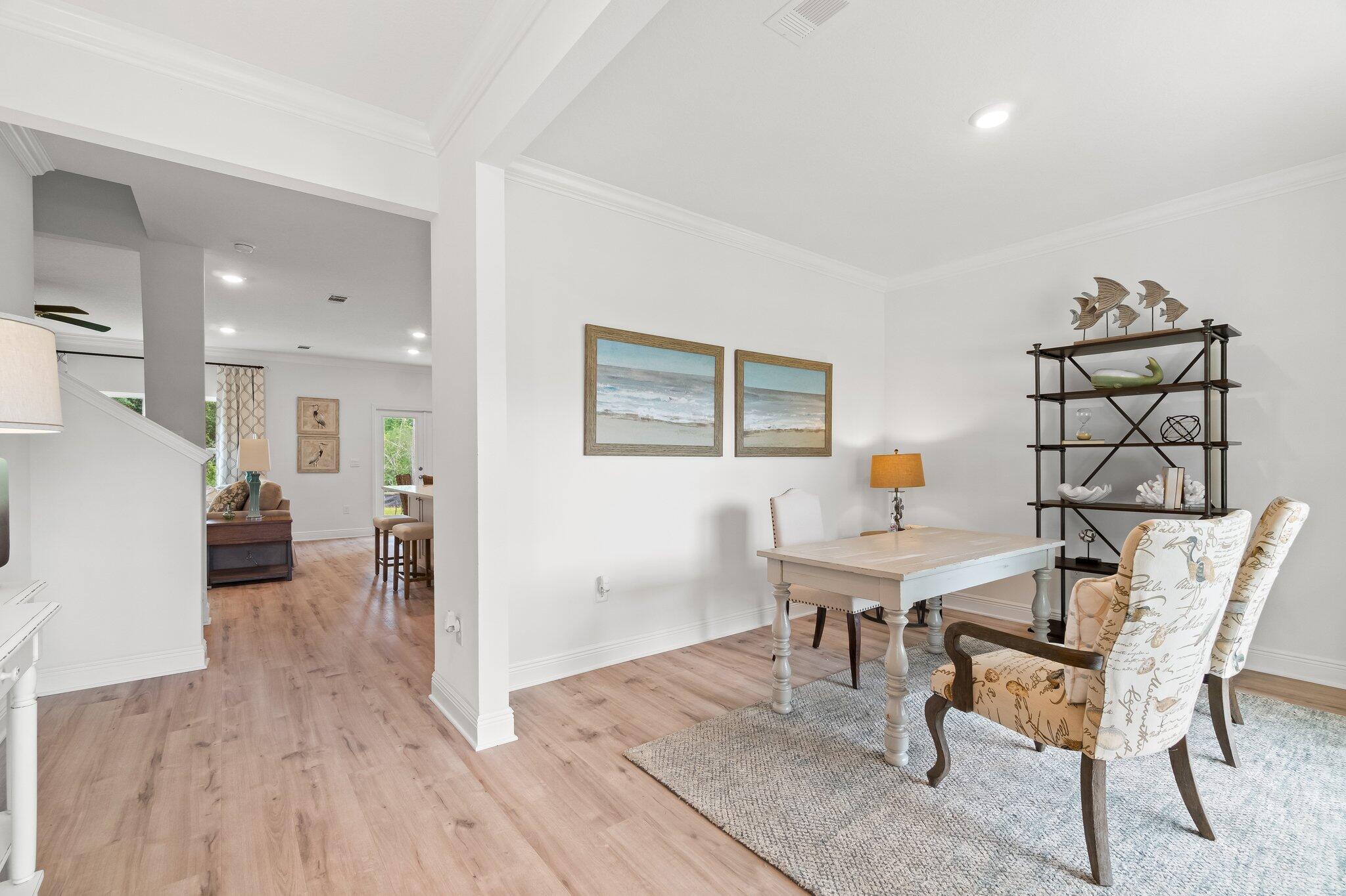 12096 East Harborview Road, Unit LOT 34 Santa Rosa Beach, FL 32459 - Photo 3 of 14 a view of a livingroom with furniture and a wooden floor