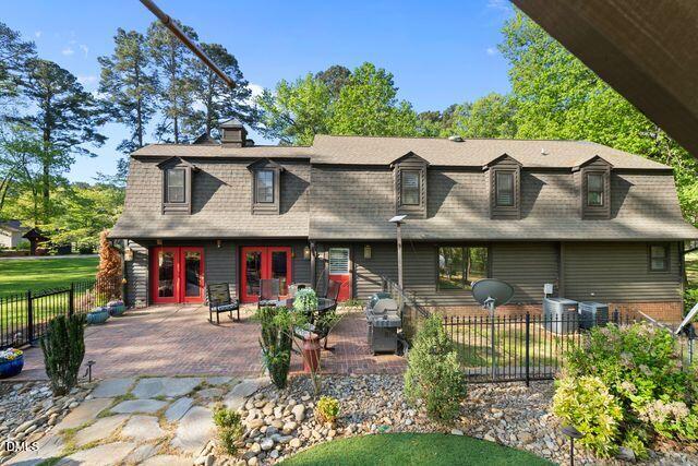 7875 Burnett Road Dunn, NC 28334 - Photo 2 of 3 END OF HOUSE FROM COURTYARD