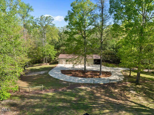 7875 Burnett Road Dunn, NC 28334 - Photo 3 of 3 GARAGE WITH LANDSCAPING
