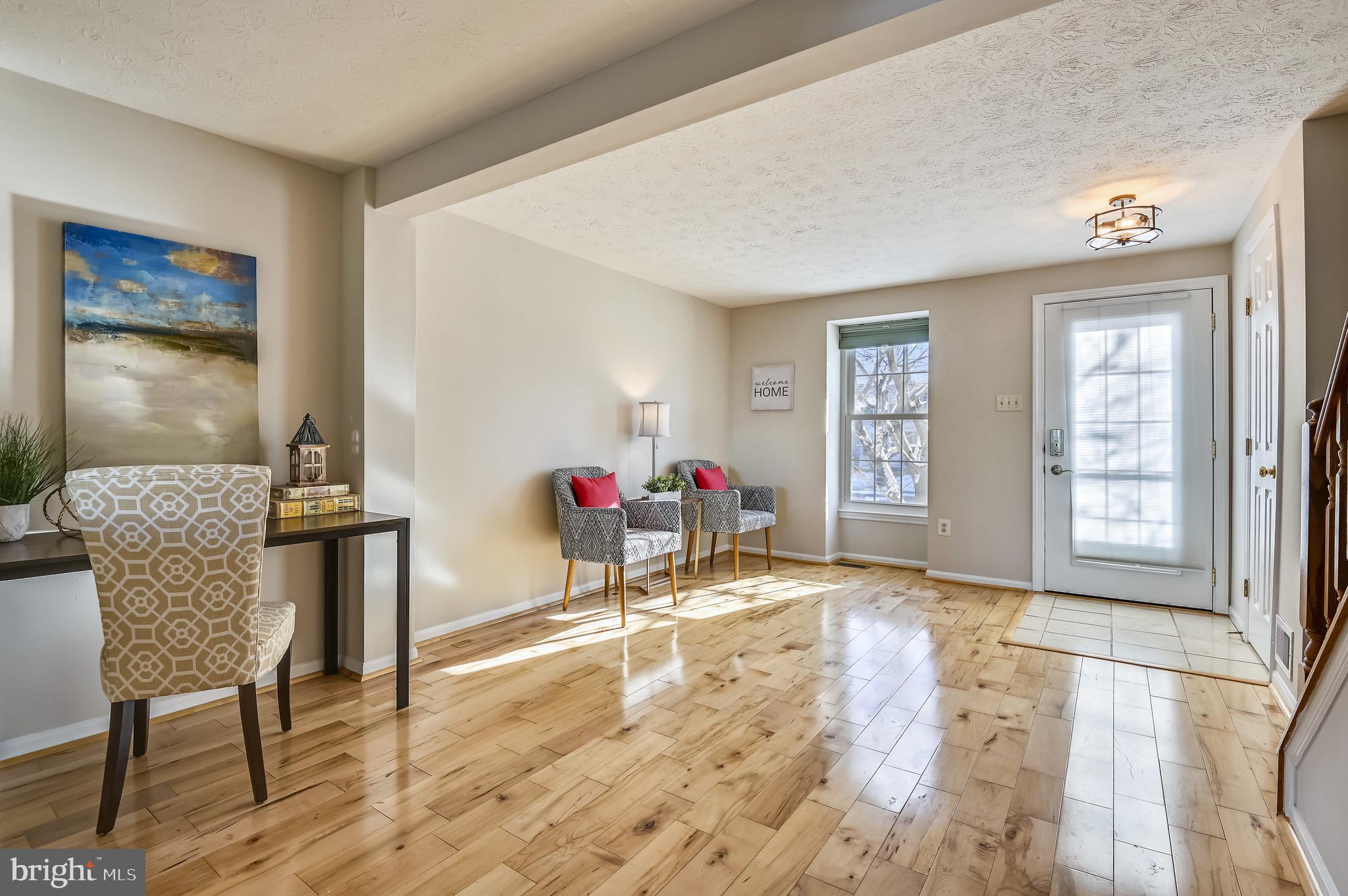 2240 Riding Crop Way Baltimore, MD 21244 - Photo 6 of 38 a living room with furniture and a window