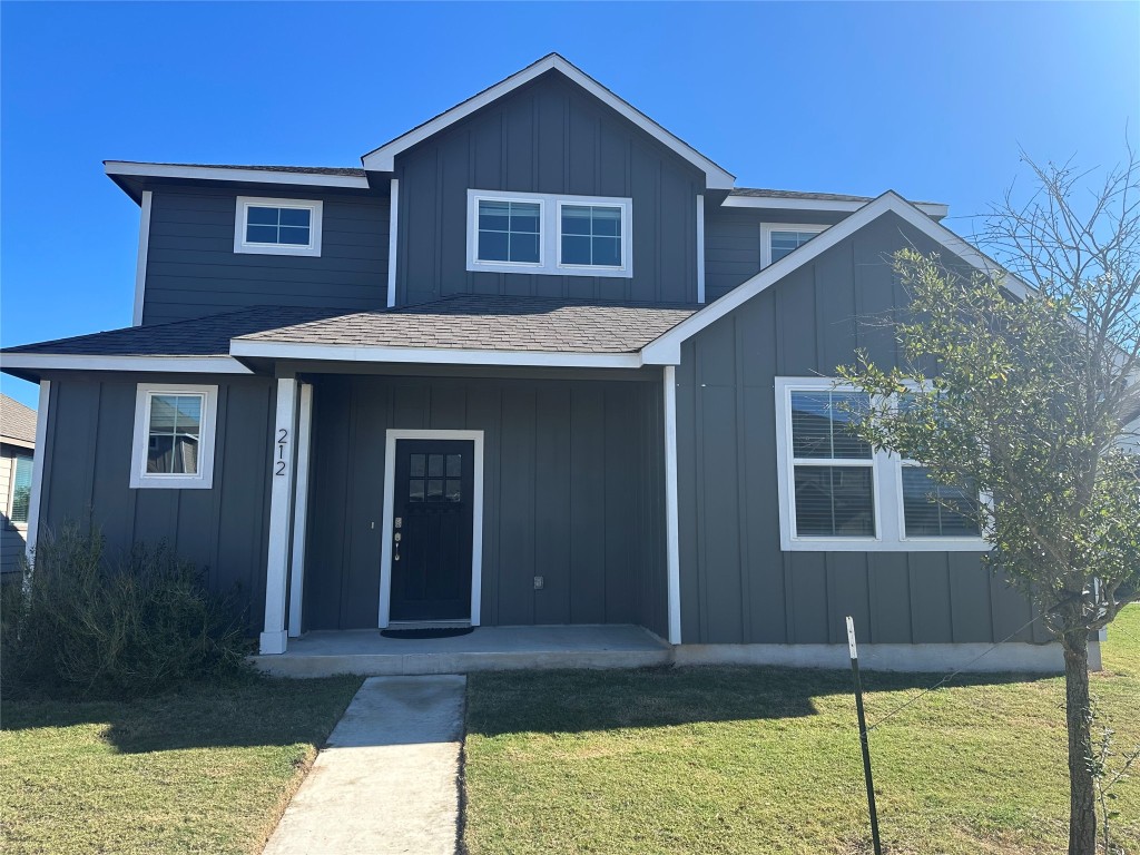 a house view with a backyard space