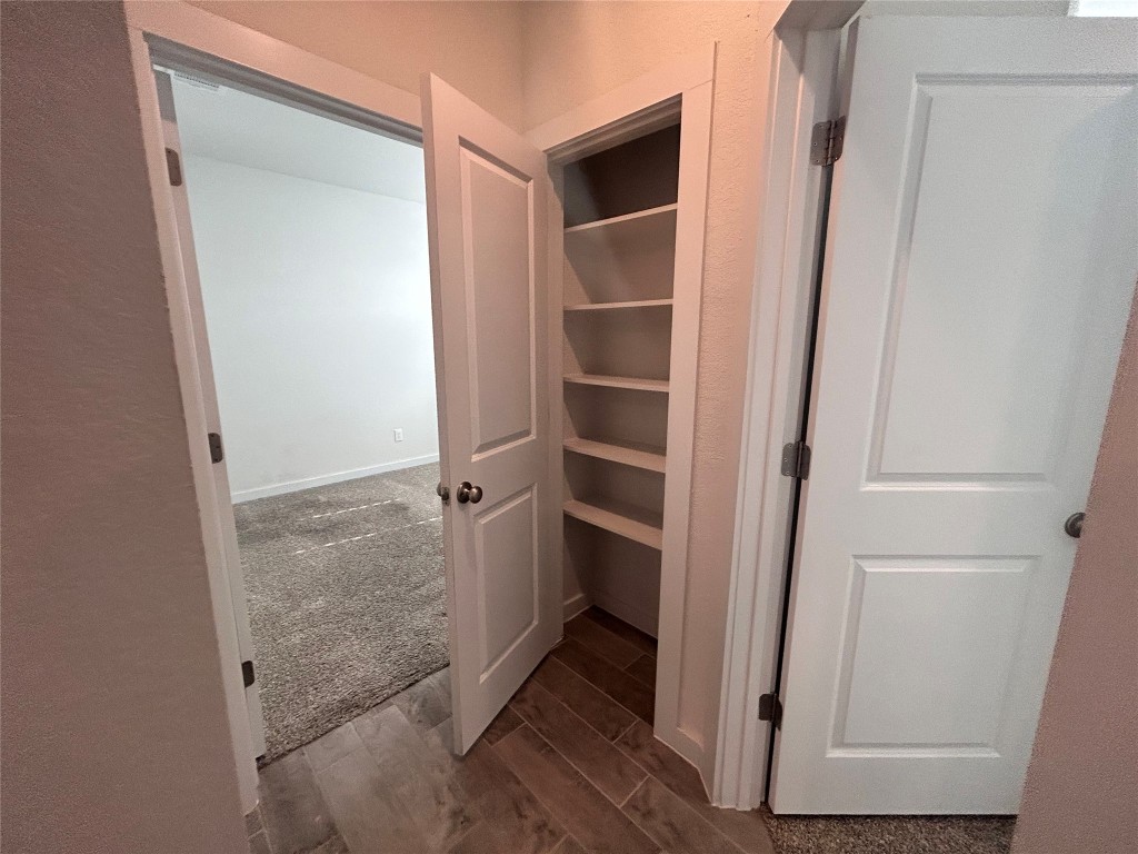 212 Whisper Rill Drive Hutto, TX 78634 - Photo 13 of 25 a view of walk in closet