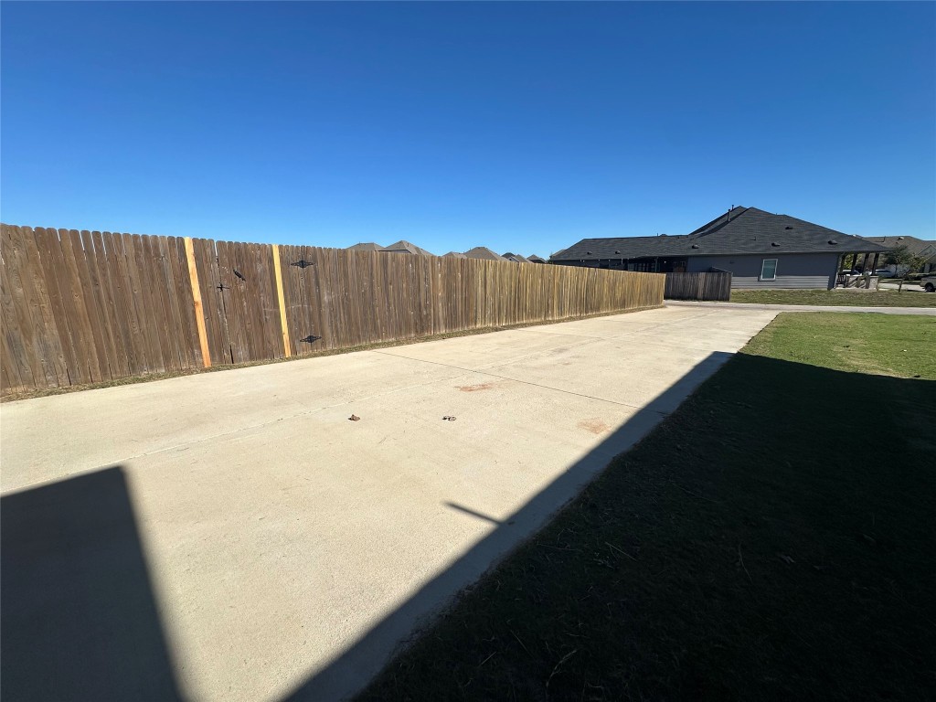 212 Whisper Rill Drive Hutto, TX 78634 - Photo 24 of 25 Extended Driveway with plenty of parking for you and your guests.