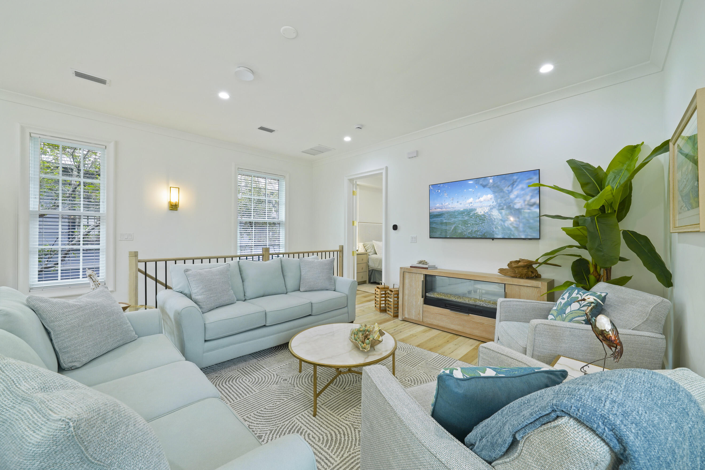25 St George's Lane Inlet Beach, FL 32461 - Photo 17 of 54 a living room with furniture and a flat screen tv