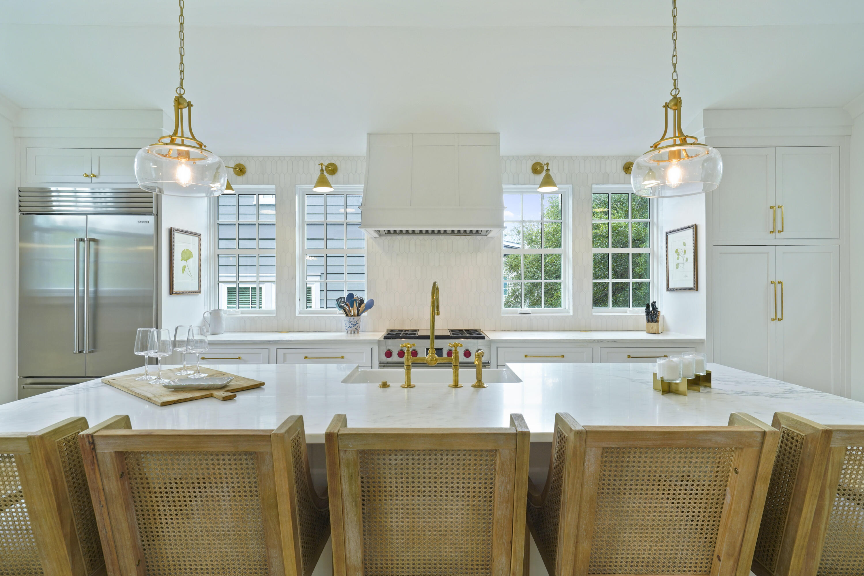 25 St George's Lane Inlet Beach, FL 32461 - Photo 21 of 54 a kitchen with a sink a stove and a chandelier