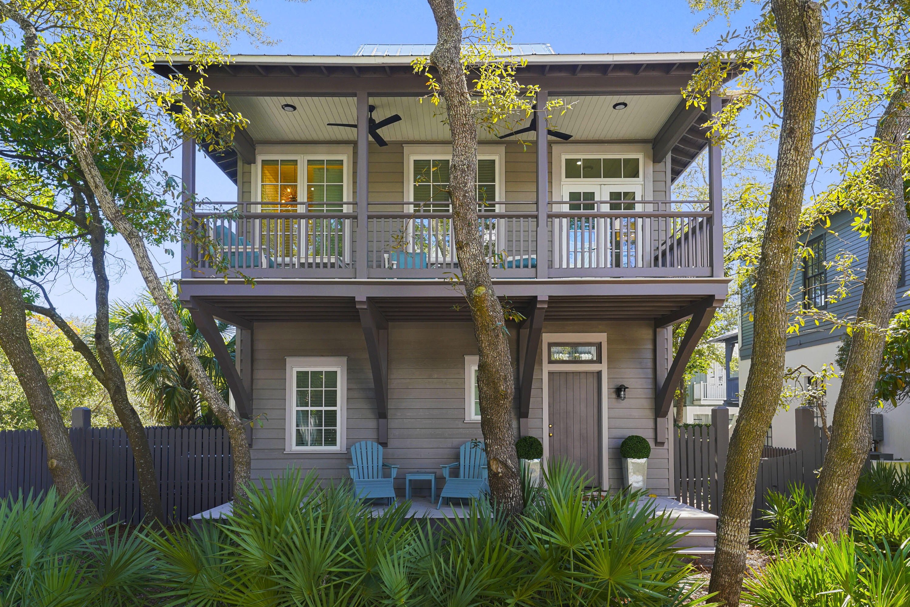 25 St George's Lane Inlet Beach, FL 32461 - Photo 4 of 54 a front view of a house with garden