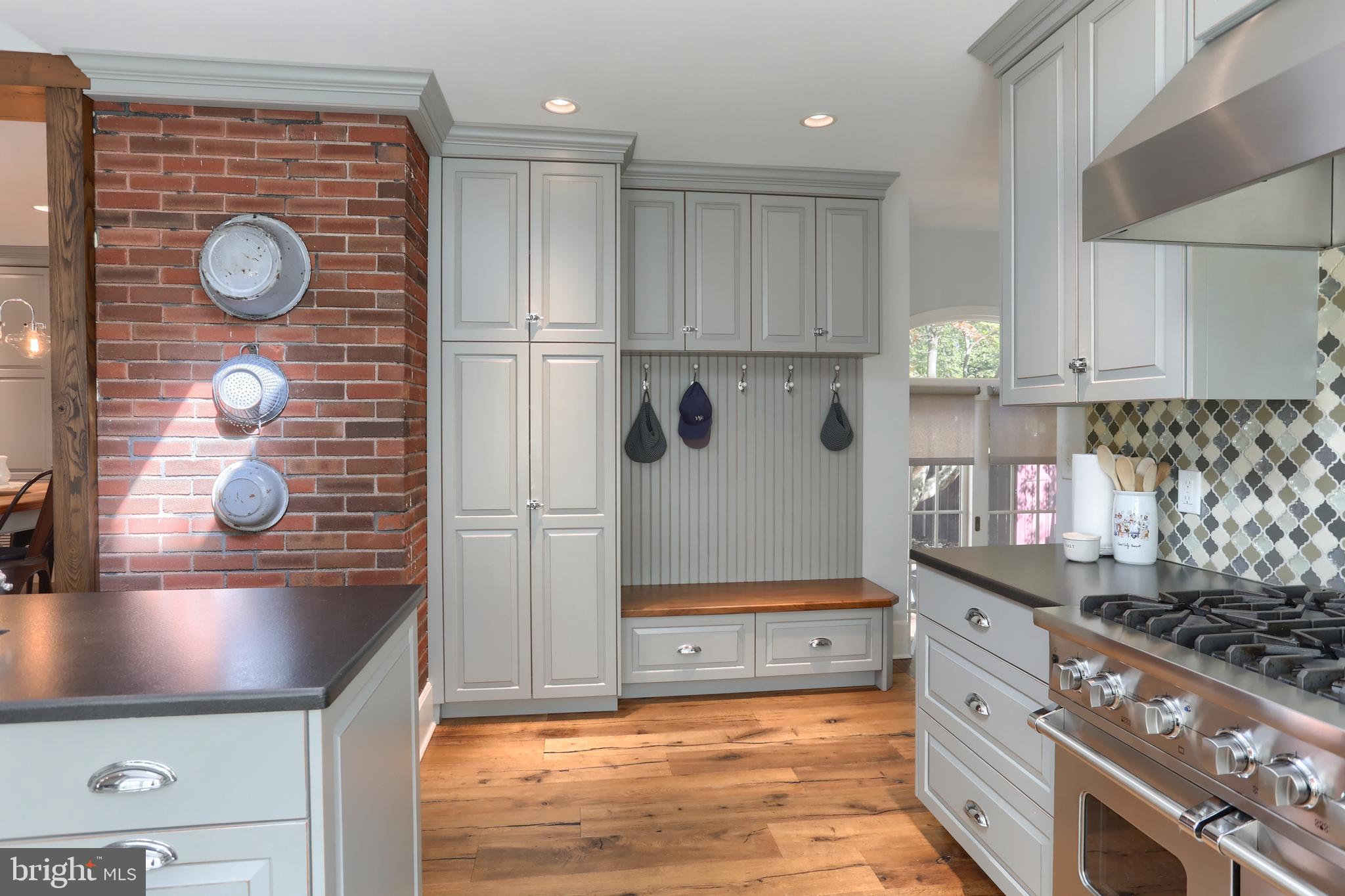 118 Elm Avenue Hershey, PA 17033 - Photo 15 of 54 a kitchen with stainless steel appliances granite countertop a sink and a stove
