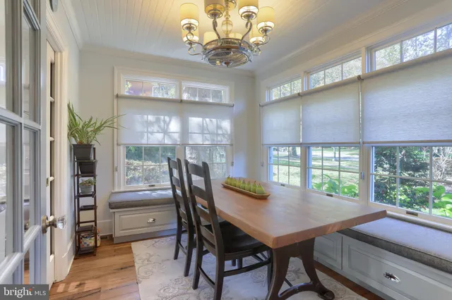 a bed room with furniture and a window